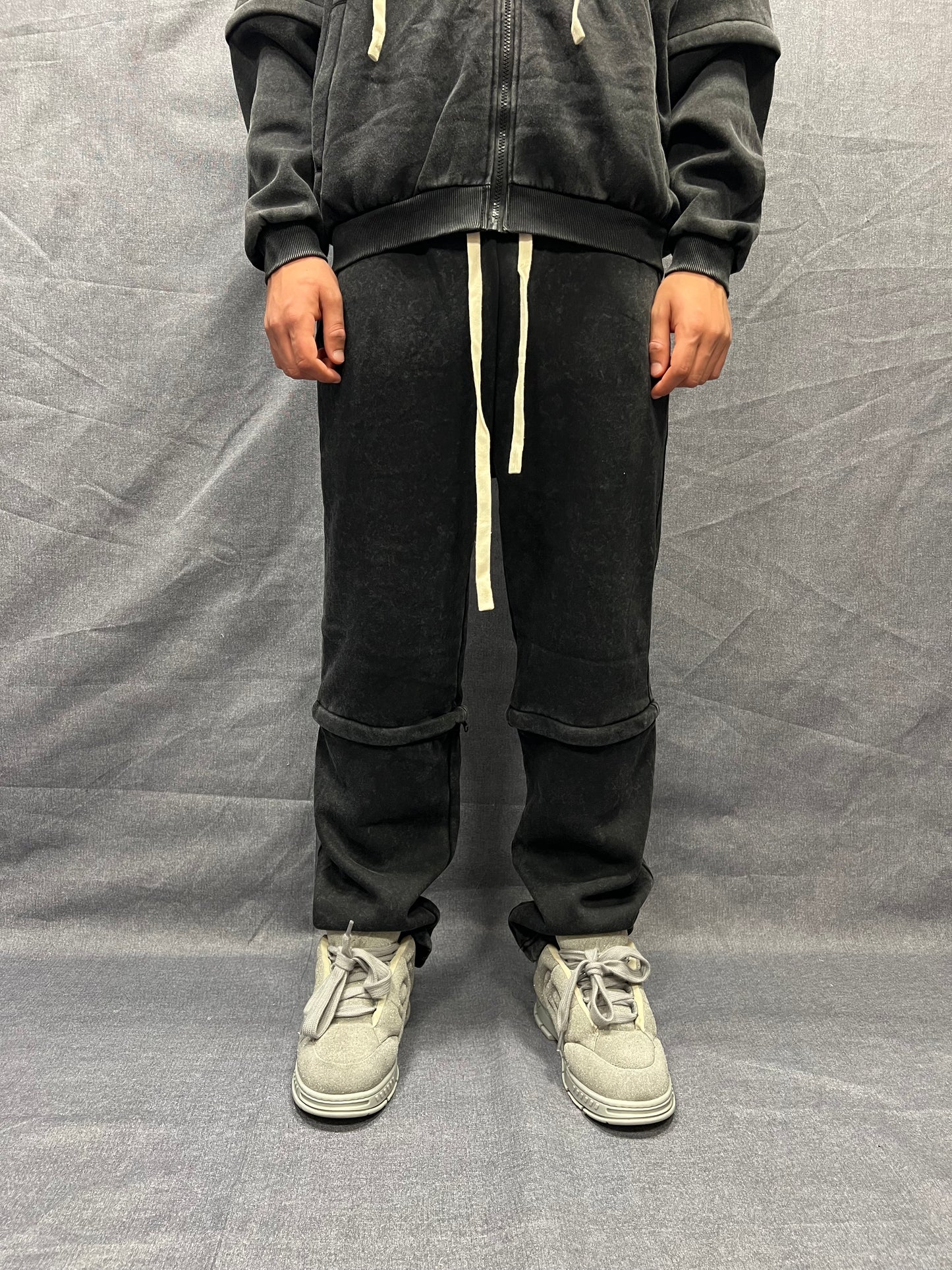 TUTA RELAXED FIT NERA EFFETTO SLAVATO CON CERNIERE STACCABILI