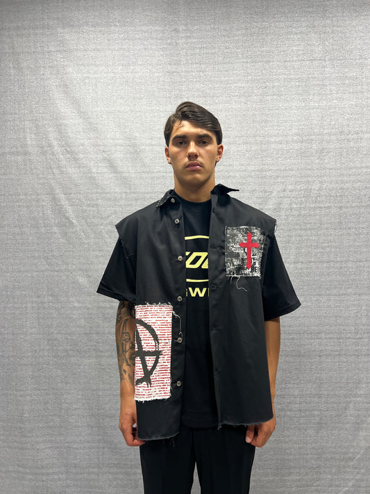 BLACK OVERSIZED SLEEVELESS SHIRT WITH EMBROIDERED PRINTS AND STUDS
