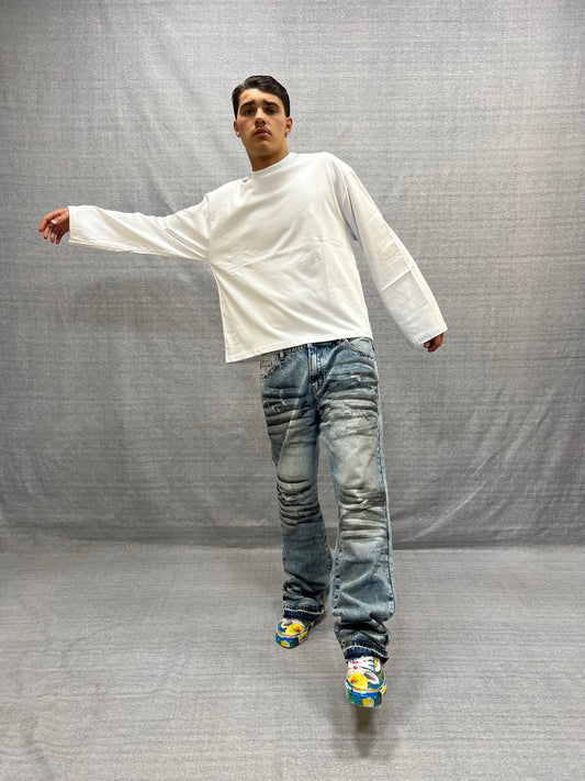 JEANS FLARE FIT BLU INDACO CHIARO STAMPA TROMPE L’ŒIL LAVAGGIO STONE CON ABRASIONI