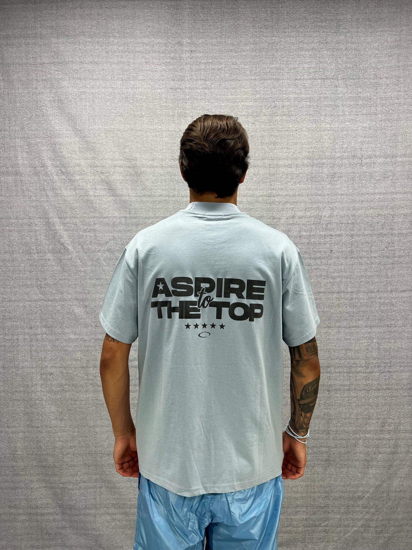 T-SHIRT BOXY FIT AZZURRA CON STAMPA GRAFICA