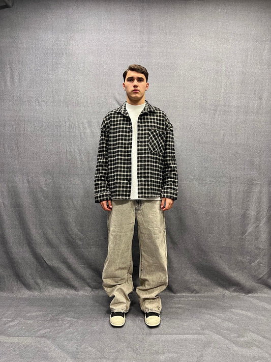 CAMICIA REGULAR FIT NERA CON STRUTTURA A QUADRI PLAID IN FLANELLA