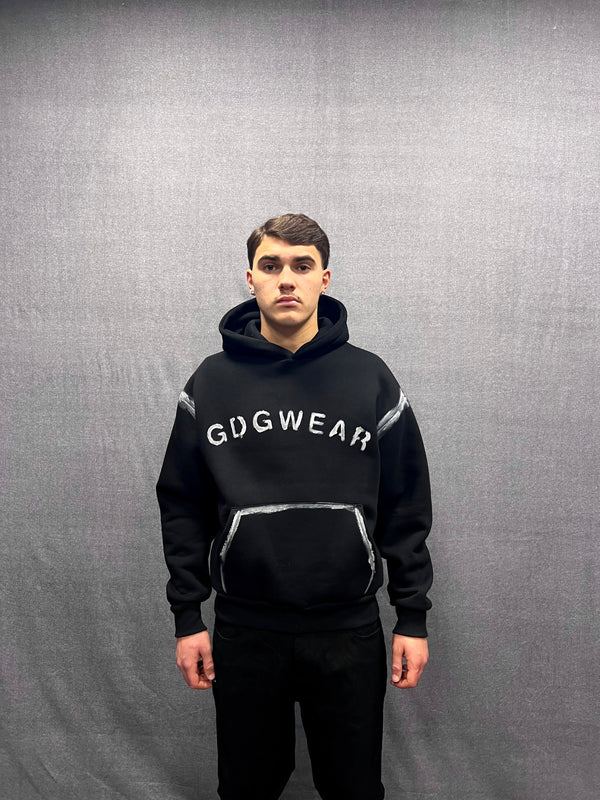 FELPA BOXY FIT NERA CON CAPPUCCIO E STAMPA GRAFICA CON PROFILI FATTI A MANO