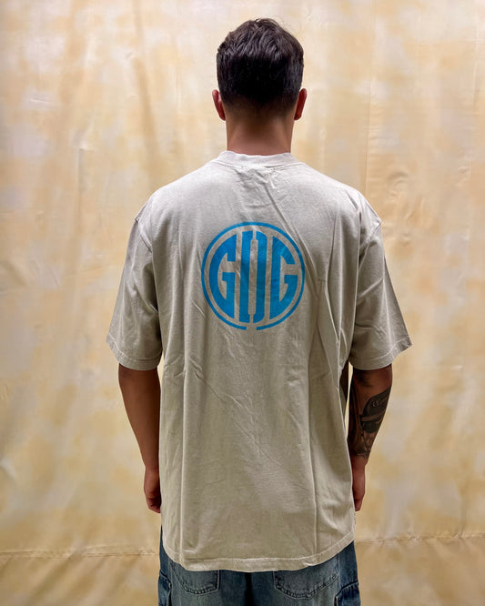 T-SHIRT BOXY FIT BEIGE CON STAMPA GRAFICA LOGO