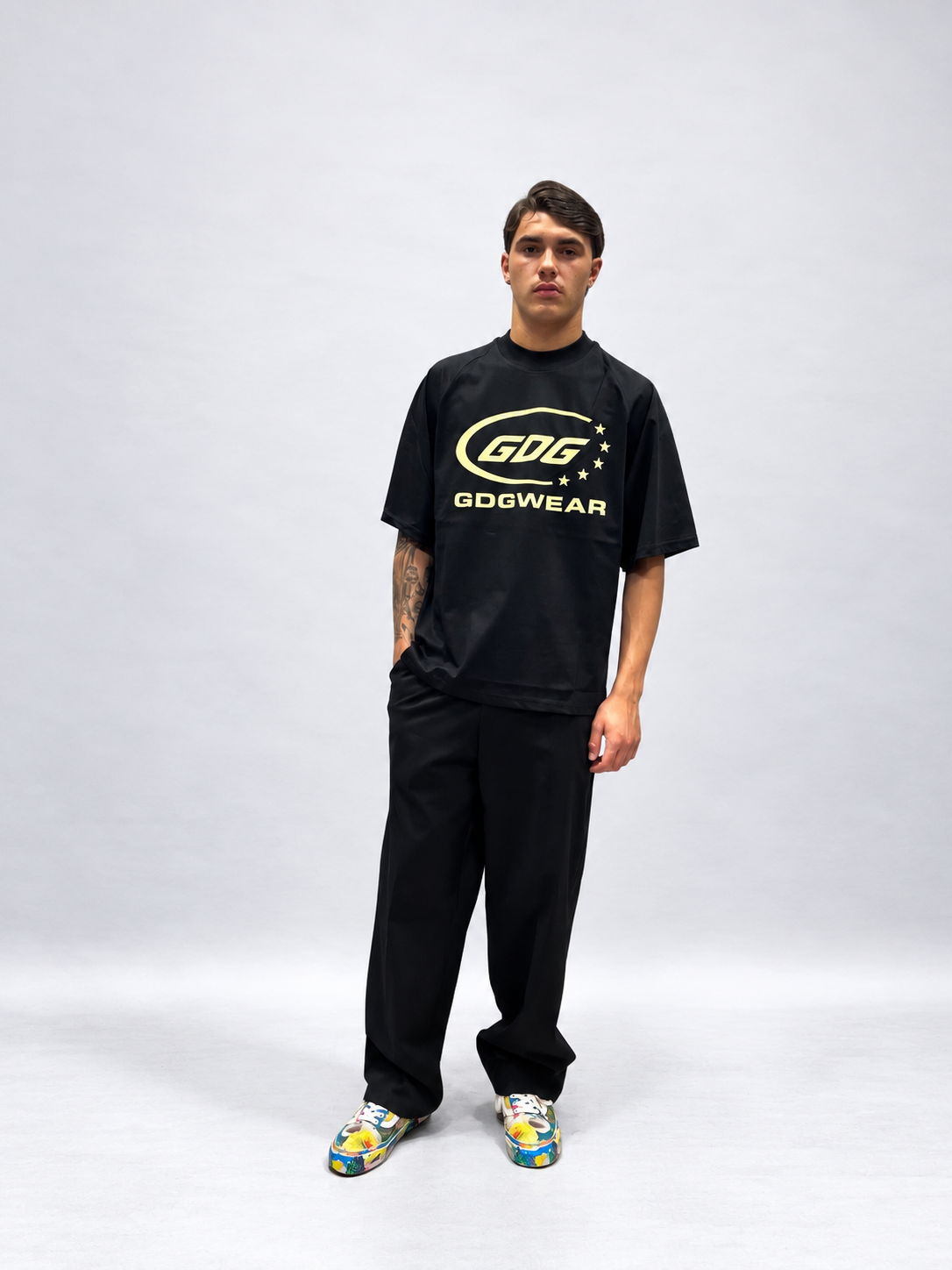 T-SHIRT BOXY FIT NERA MANICA RAGLAN CON STAMPA GRAFICA