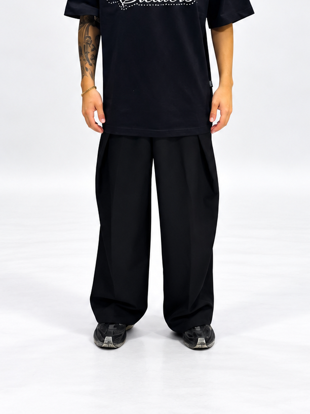 PANTALONI LOOSE FIT NERI CON VITA ELASTICIZZATA E PINCE