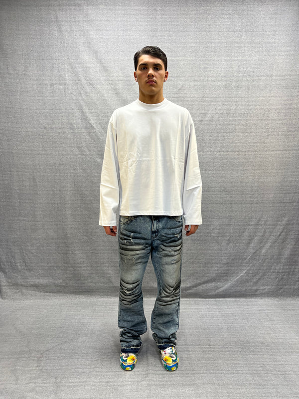 JEANS FLARE FIT BLU INDACO CHIARO STAMPA TROMPE L’ŒIL LAVAGGIO STONE CON ABRASIONI